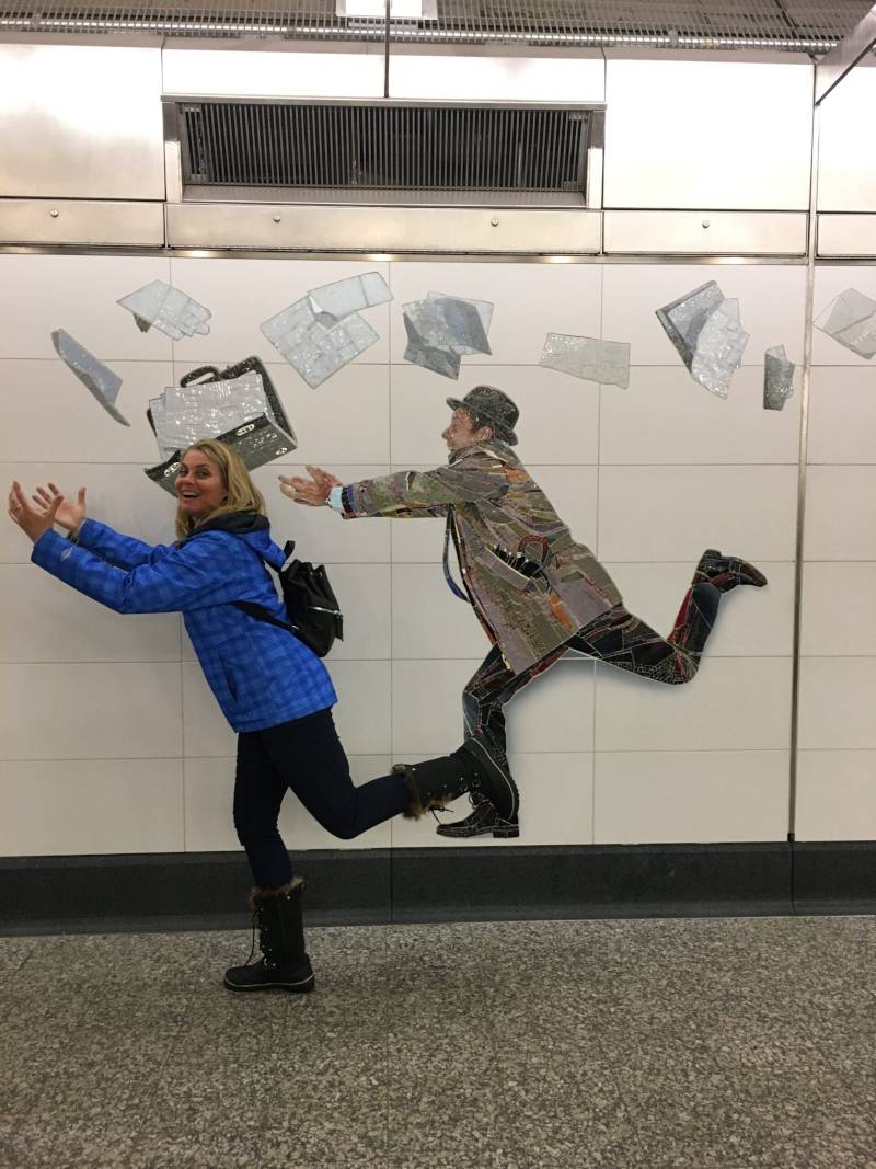 Kim in front of subway station art